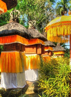 A small temple in the rice field, seen from Villa Sabandari, a boutique hotel in Ubud, Bali